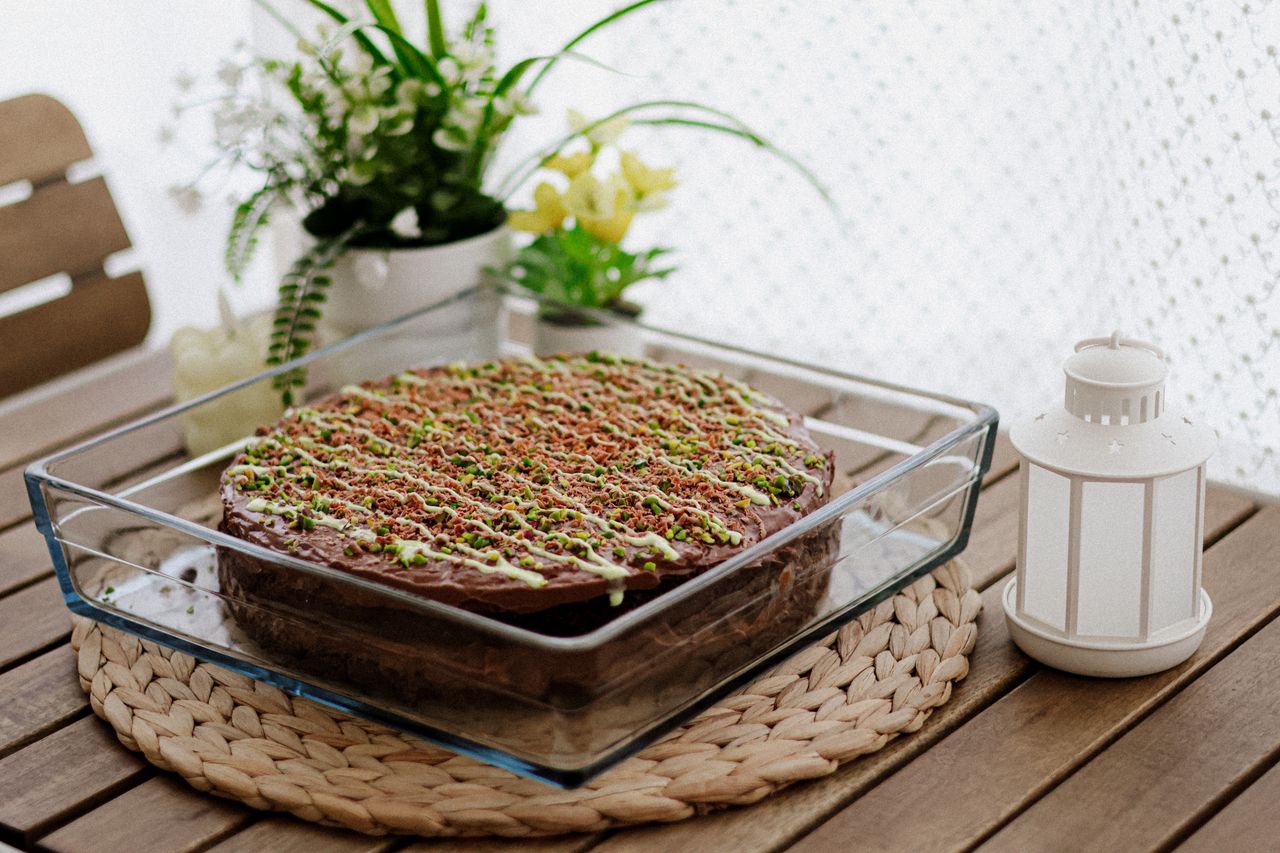 A homemade chocolate cake on a wooden table